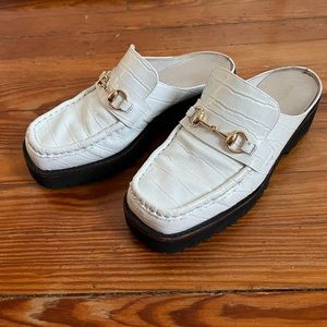 Intentionally _________ mule loafers.  Size 10 runs small, fits like a 9.